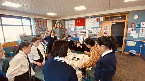 Year 7 learn how to hold brush pen