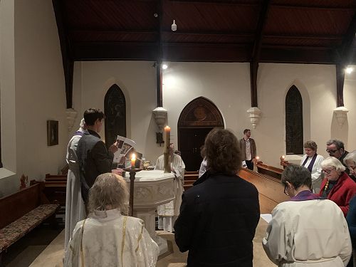Gathering at the font during the Easter Vigil, St Peter's Caversham.