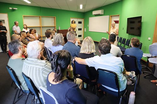 Jan Baker greeting couples