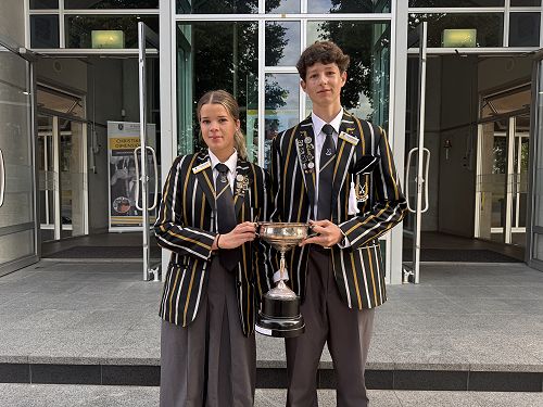 Hamilton House leaders holding the winner's trophey