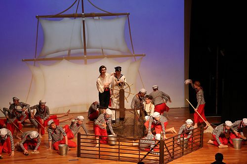 The sailors on board the ship as the sea gets rough