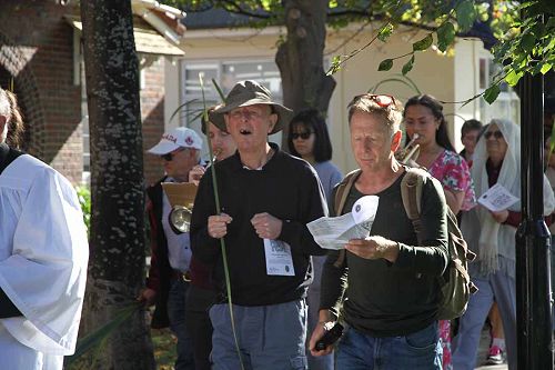 In full voice, Palm Sunday procession