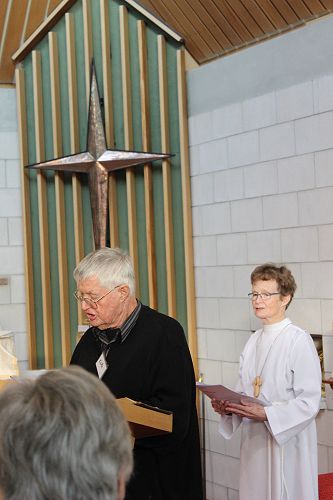 Keith Gover, Archdeacon Emeritus, gives the Gospel reading (with Lois Shallard)
