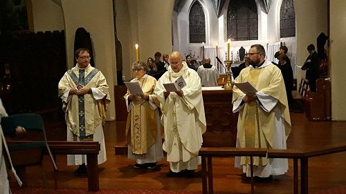 Priests from St Paul's Cathedral and Dunedin North lead the Mass