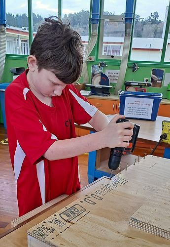 Noah's team building a spray booth at Oamaru Intermediate
