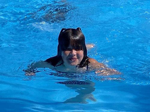 Izabel competing in her schools' swimming sports
