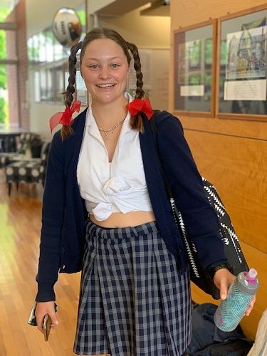 Tessa in the boarding house for a dress up event