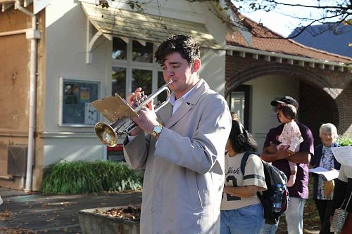 Ewan Wallace helps lead the procession