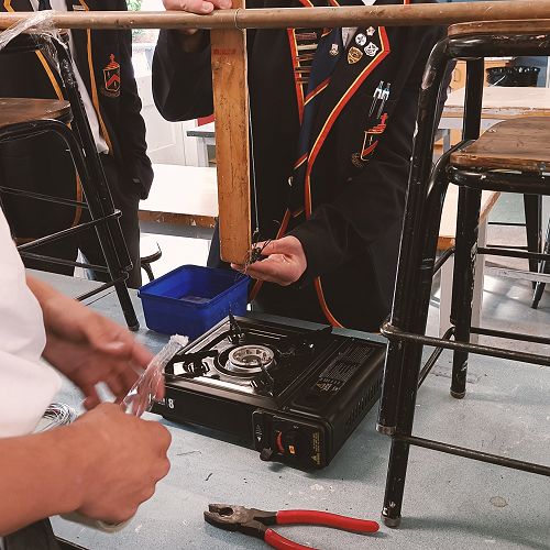 Sam Hancox setting up test for flammability of wool.