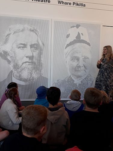Esther McNaughton, Suter's Art Educator, introduces the students to Bishop Suter and his wife, Amelia