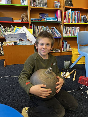 Masyn at Hub with a piece of a Russian Rocket that crashed in 1972