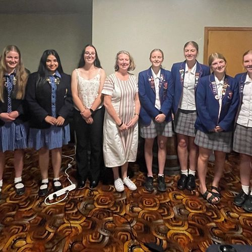 Guest speakr, Katherine Barr, flanked by the student leaders of Blue Mountain College, Maruawai College and St Peter's College