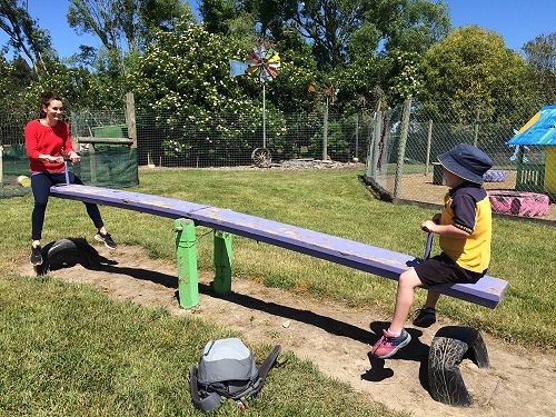 Miss Bramwell and Rachel enjoying a swing.