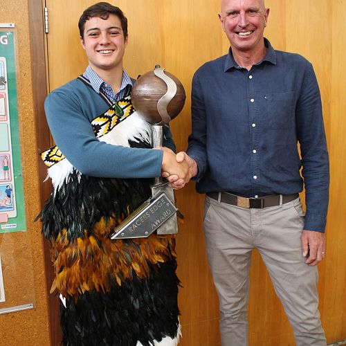 Ryan Enoka (Mana Pounamu and Te Kura Ara Mai recipient, Best All Round Year 10 student, Racers Edge Award) with Steve Schikker from Racers Edge.