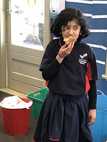 Soha enjoying the bread, butter and jam!