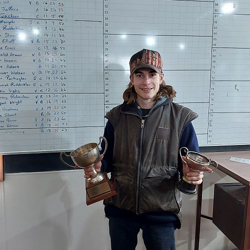 Ryan Partington proudly showing his two trophies
