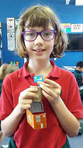 Kaela and her just planted edible little garden