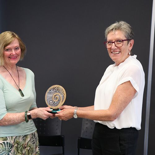 Professor Christine Rubie- Davies receiving the Tuakana Taina from Deputy Principal Marie Stribling