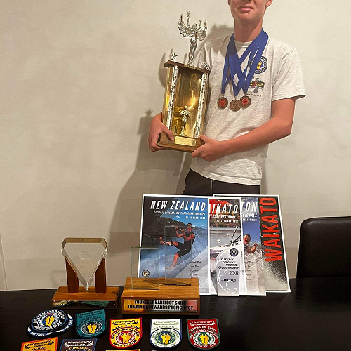 Mitchell Rush shows off water skiing awards
