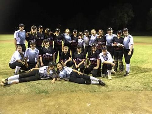 Zillah is the second team member on the right, on her knees. 