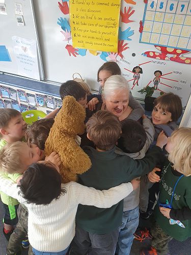 Mrs Augustine swamped by the Year 1 students on "Support our Principal" day!