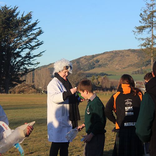 Mad Scientist, aka The Principal inspects some of the rockets before launching.