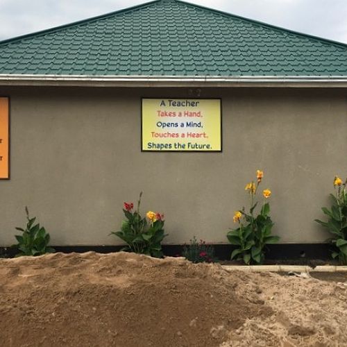 Motivating sayings on a school building