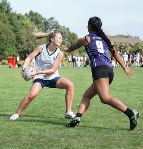 Making a play against Nelson College for Girls.