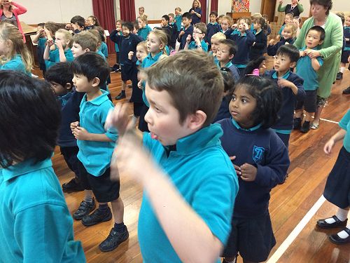 Here is Leon putting on his super hero mask.