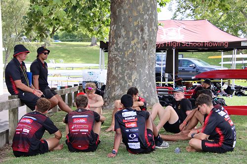 The U17 Eight at their pre race briefing with coach, Bruce Holden and Fitness Trainer, Mr Harrison.