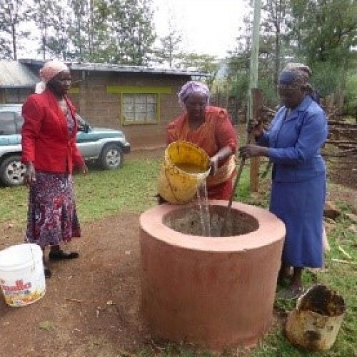 A biogas digester with water being added to the cow dung to
create biogas