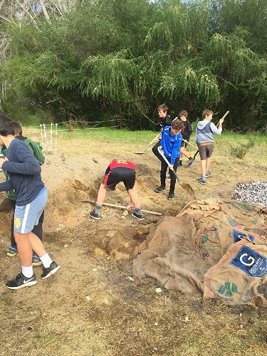 The sacks were soaked overnight in containers of water. This helps create the steam and to prevent things catching on fire!
