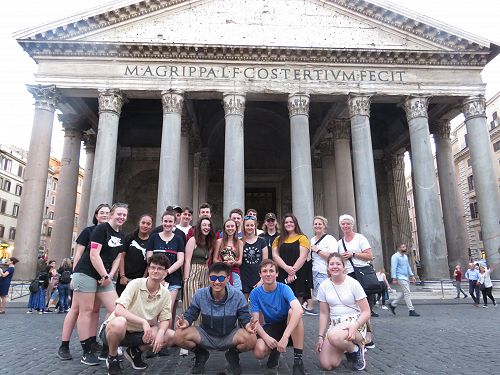 The group poses outside The Pantheon, Rome. 