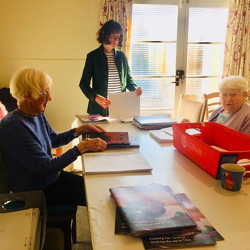 Packing magazines 6 March 2023. L-R Susie Logan OP, Ann Hassan, Shirley Curran