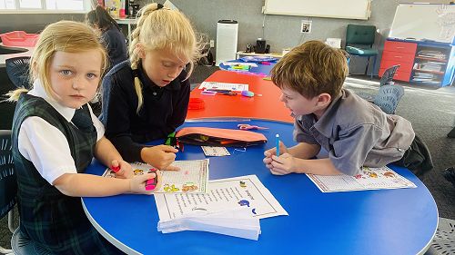 Students working on different activities about the Chinese New Year celebrations.