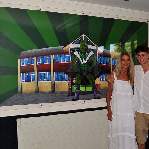 Milan Hood and mother Caroline with Shrek painting