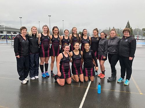 Wet weather doesn't stop the senior A netball team from having plenty to smile about.