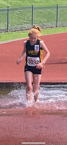 Ruby Nicholson competing in the Steeplechase