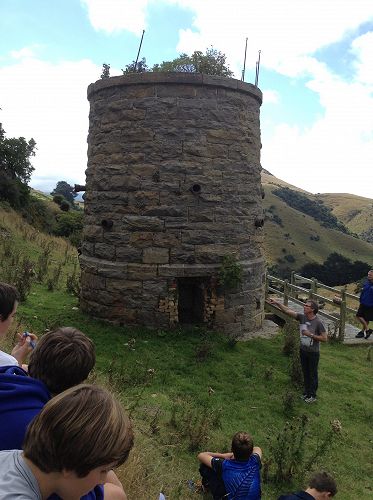 Mr Avis explains the history and function of the Lime Kilns. Otago Peninsula. Year 9 Science Field Trip.  