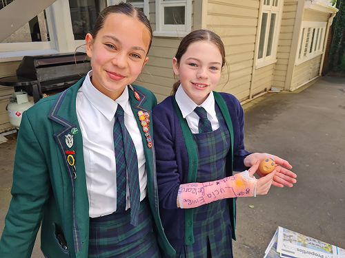 Bella and Ruby pose with Baby Petuna who sustained minor facial injuries during landing.