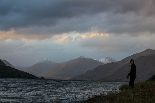 Mr Brown fishing as the rain clears