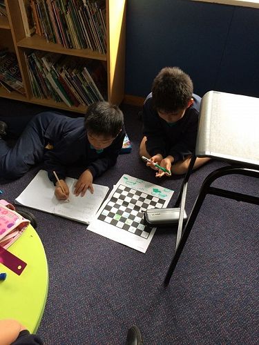 The boys working hard on their problem solving!