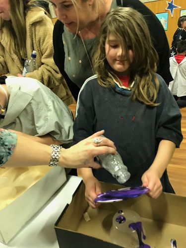 Lyla very focused on her art work.     