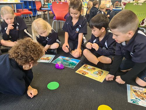 Coding the MouseBot to move through the story as we retell!