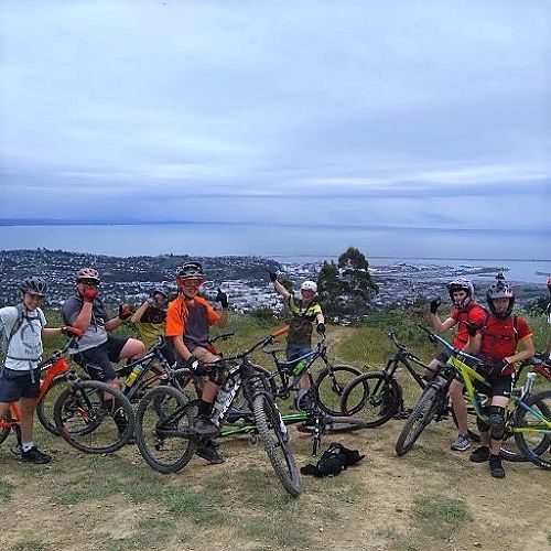 The mountain bike madness group make the most of the view.