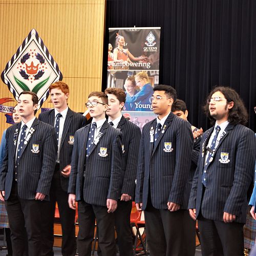 Close up of the Polyhymnia boys singing at the fundraising concert