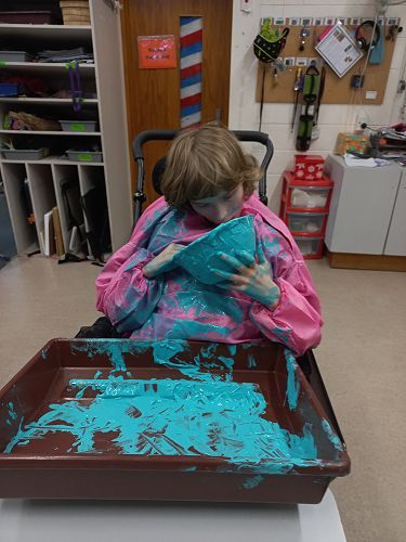 Charlotte painting her bowl..and everything else!