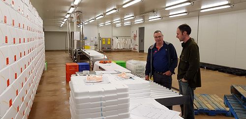 Adam Rusk, Auckland Factory Manager, nearest, with Grant Walker, New Zealand Operations Manager, reviewing processes.
