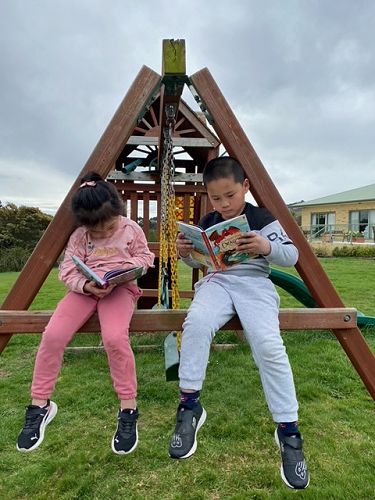 Dylan and Chelsea Wang reading in another unusual place