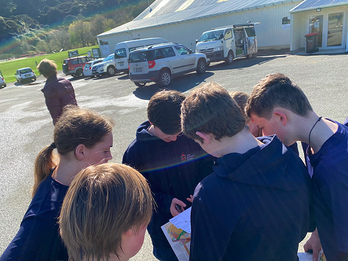 Columba and JMC mixed team working together in the orienteering challenge